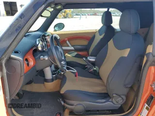 2006 MINI Convertible S with VIN WMWRH33576TF89127, listed as a Copart auction lot 49763365 with 150,446 mi miles and Salvage title. Bid and sale history available at DreamBid. Image 7.