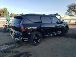 2024 Kia EV9 GT-Line with VIN KNDAEFS54R6026838, listed as a Copart auction lot 77177714 with 7,413 mi miles and Salvage Title. Bid and sale history available at carsss.com. Image 3.