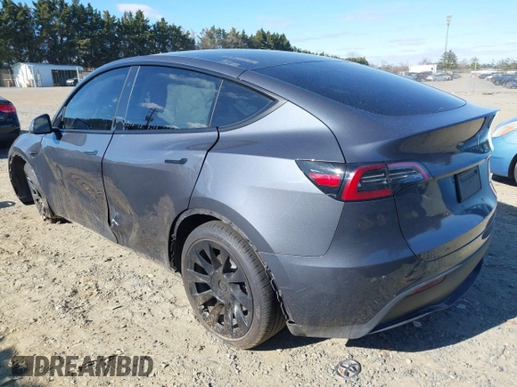 2023 Tesla Model Y Long Range with VIN 7SAYGDEE4PA145922, listed as a IAAI auction lot 41771974 with 22,670 mi miles. Bid and sale history available at carsss.com. Image 3.