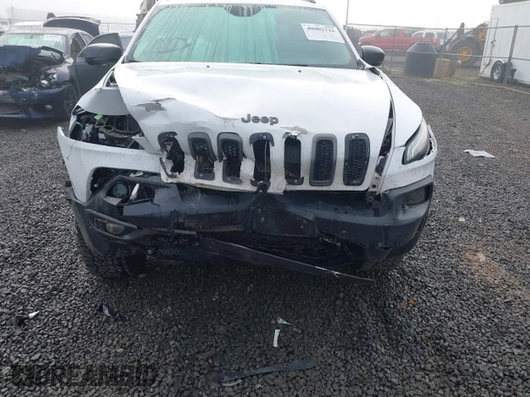 2017 Jeep Cherokee Trailhawk L Plus with VIN 1C4PJMBS2HD225011, listed as a IAAI auction lot 40802716 with 73,714 mi miles. Bid and sale history available at carsss.com. Image 6.