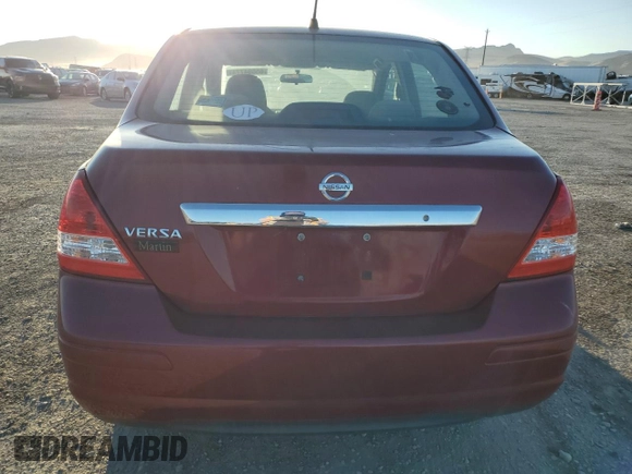 2009 Nissan Versa 1.8 S with VIN 3N1BC11E39L363606, listed as a Copart auction lot 65594774 with 110,191 mi miles and Salvage Title. Bid and sale history available at carsss.com. Image 6.