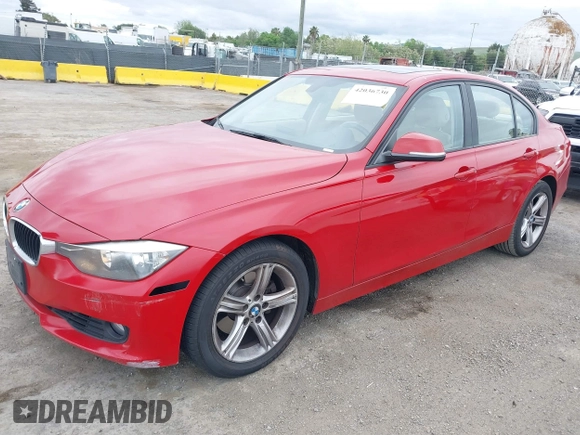 2013 BMW 3 Series 328i with VIN WBA3A5C51DF353779, listed as a IAAI auction lot 42036730 with 133,674 mi miles. Bid and sale history available at carsss.com. Image 2.