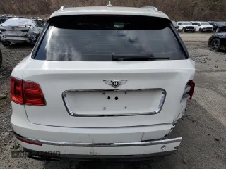2020 Bentley Bentayga V8 z VIN SJAAM2ZV2LC028213, wystawiony jako Copart lot #52550255 z przebiegiem 50 238 mil mil oraz Szkody całkowita. Historia ofert i sprzedaży dostępna na DreamBid. Obrazek 6.