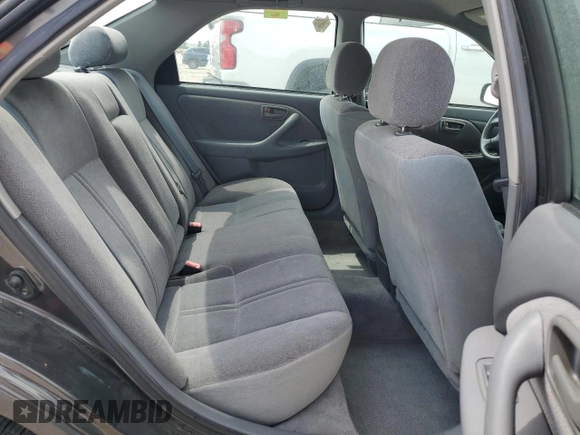 2001 Toyota Camry CE z VIN 4T1BG22K31U795050, wystawiony jako Copart lot #55054025 z przebiegiem 161 228 mil mil oraz Szkoda całkowita • Salvage title. Historia ofert i sprzedaży dostępna na DreamBid. Obrazek 10.