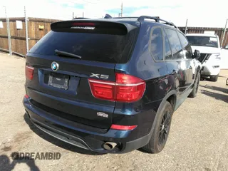 2012 BMW X5 35i с VIN 5UXZV4C5XCL749123, выставлен на аукционе IAAI как лот 41749728 с пробегом 124 193 миль миль и . История ставок и продаж доступна на DreamBid. Изображение 4.