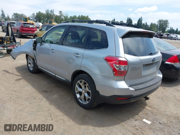 2015 Subaru Forester Touring with VIN JF2SJAWC6FH546472, listed as a IAAI auction lot 42513843 with 107,951 mi miles and . Bid and sale history available at DreamBid. Image 3.