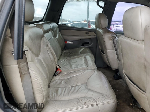 2001 GMC Yukon SLT z VIN 1GKEC13T51J145673, wystawiony jako Copart lot #83568954 z przebiegiem 310 415 mil mil oraz Szkoda całkowita • Salvage title. Historia ofert i sprzedaży dostępna na DreamBid. Obrazek 11.