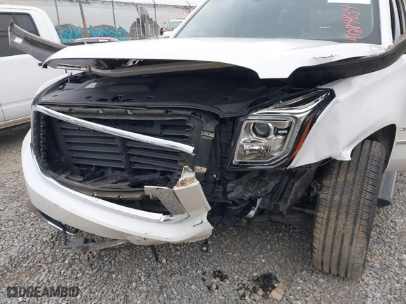 2017 GMC Yukon Denali with VIN 1GKS2CKJ3HR170889, listed as a IAAI auction lot 41384834 with 107,930 mi miles. Bid and sale history available at carsss.com. Image 6.