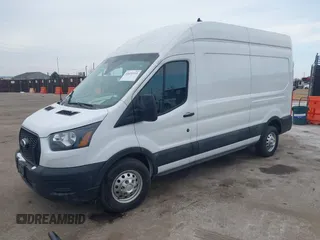 2023 Ford Transit Cargo with VIN 1FTBR2X87PKA51211, listed as a IAAI auction lot 41631315 with 42,688 mi miles and . Bid and sale history available at DreamBid. Image 18.