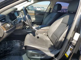 2015 BMW 7 Series 740i with VIN WBAYA6C5XFD826895, listed as a Copart auction lot 66889794 with Not Provided miles and Salvage Title. Bid and sale history available at DreamBid. Image 7.