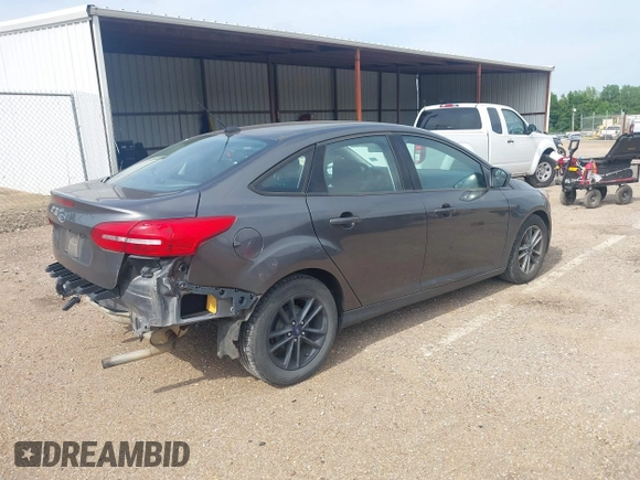 2018 Ford Focus SE with VIN 1FADP3F29JL288761, listed as a IAAI auction lot 42290510 with 93,463 mi miles and . Bid and sale history available at DreamBid. Image 4.