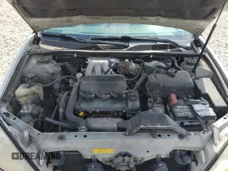 2002 Toyota Camry XLE z VIN 4T1BF32K12U519069, wystawiony jako Copart lot #55501405 z przebiegiem 186 142 mil mil oraz Szkoda całkowita • Salvage title. Historia ofert i sprzedaży dostępna na DreamBid. Obrazek 11.