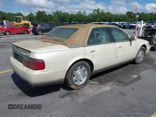 2001 Cadillac Seville Luxury SLS z VIN 1G6KS54Y81U110047, wystawiony jako IAAI lot #42436746 z przebiegiem 107 360 mil mil oraz . Historia ofert i sprzedaży dostępna na DreamBid. Obrazek 4.