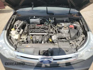 2008 Ford Focus SE z VIN 1FAHP35NX8W215744, wystawiony jako Copart lot #56096055 z przebiegiem 165 827 mil mil oraz Szkoda całkowita • Salvage title. Historia ofert i sprzedaży dostępna na DreamBid. Obrazek 11.