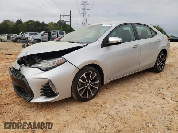2019 Toyota Corolla L with VIN 5YFBURHE5KP910088, listed as a Copart auction lot 52401885 with 130,124 mi miles and Salvage Title. Bid and sale history available at DreamBid. Image 1.