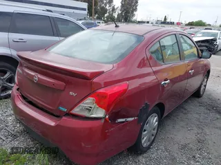 2016 Nissan Versa SV with VIN 3N1CN7AP0GL866431, listed as a IAAI auction lot 41017735 with 104,683 mi miles. Bid and sale history available at carsss.com. Image 4.