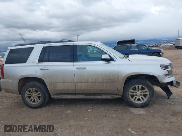 2019 Chevrolet Tahoe LT with VIN 1GNSKBKC7KR175468, listed as a IAAI auction lot 41680274 with 159,155 mi miles and . Bid and sale history available at DreamBid. Image 14.