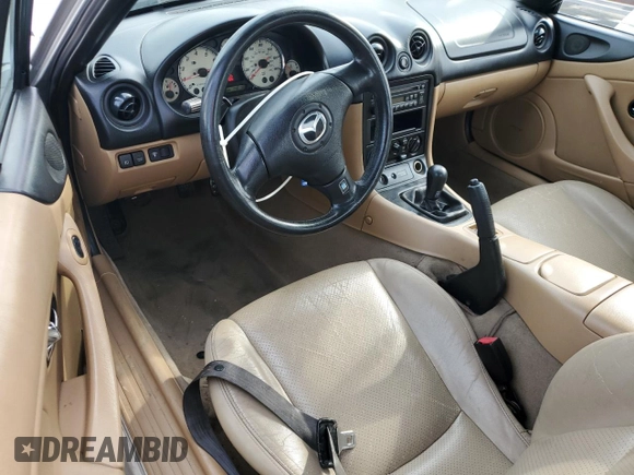 2001 Mazda MX-5 Miata z VIN JM1NB353510208400, wystawiony jako Copart lot #54516515 z przebiegiem 148 198 mil mil oraz Czysty tytuł • Clean title. Historia ofert i sprzedaży dostępna na DreamBid. Obrazek 8.