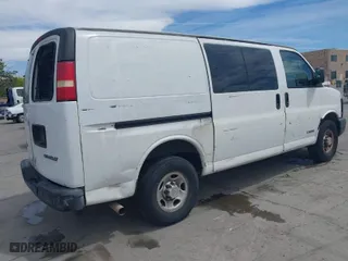 2005 Chevrolet Express Cargo Van with VIN 1GCHG35U651127686, listed as a IAAI auction lot 42028915 with 357,912 mi miles. Bid and sale history available at carsss.com. Image 4.