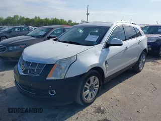 2011 Cadillac SRX Performance Collection with VIN 3GYFNBEYXBS540807, listed as a IAAI auction lot 42034047 with 198,429 mi miles. Bid and sale history available at carsss.com. Image 2.