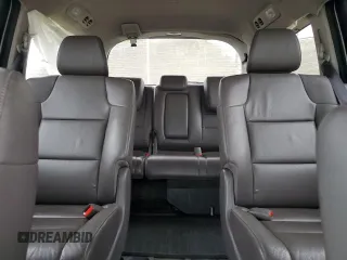 2014 Honda Odyssey Touring z VIN 5FNRL5H91EB089813, wystawiony jako Copart lot #58674275 z przebiegiem Nie podano mil oraz Szkoda całkowita • Salvage title. Historia ofert i sprzedaży dostępna na DreamBid. Obrazek 10.