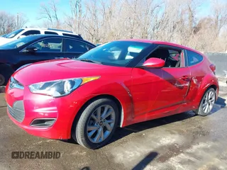 2016 Hyundai Veloster z VIN KMHTC6AD1GU260219, wystawiony jako IAAI lot #41114806 z przebiegiem 128 000 mil mil oraz . Historia ofert i sprzedaży dostępna na DreamBid. Obrazek 15.