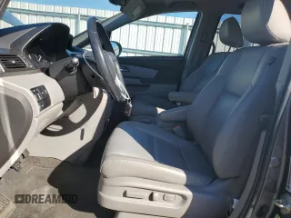 2014 Honda Odyssey Touring with VIN 5FNRL5H96EB061876, listed as a Copart auction lot 49759935 with 132,591 mi miles and Salvage Title. Bid and sale history available at DreamBid. Image 7.
