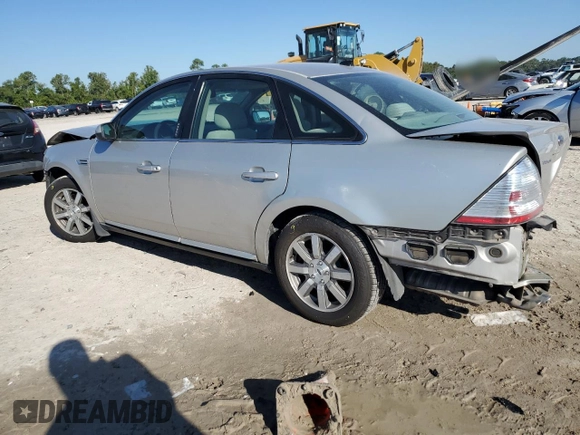2008 Ford Taurus SEL with VIN 1FAHP24W48G133054, listed as a Copart auction lot 73537024 with 123,635 mi miles and Salvage Title. Bid and sale history available at carsss.com. Image 2.