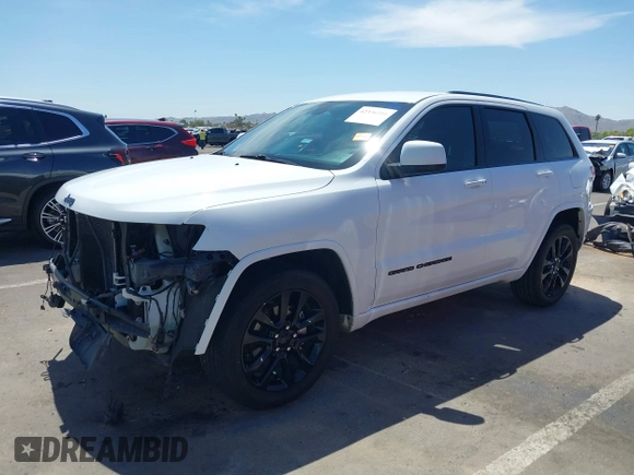 2018 Jeep Grand Cherokee Altitude z VIN 1C4RJEAG8JC380640, wystawiony jako IAAI lot #42336318 z przebiegiem 109 675 mil mil oraz . Historia ofert i sprzedaży dostępna na DreamBid. Obrazek 18.