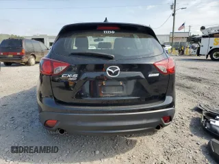 2016 Mazda CX-5 Sport with VIN JM3KE4BY6G0749973, listed as a Copart auction lot 54131635 with 97,480 mi miles and Salvage title. Bid and sale history available at DreamBid. Image 6.