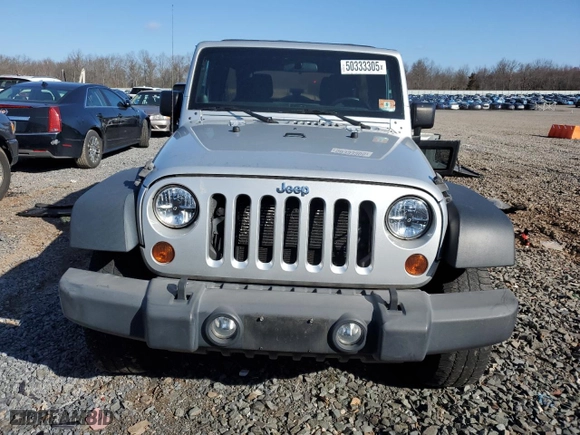2012 Jeep Wrangler Unlimited Sport with VIN 1C4BJWDG6CL240737, listed as a Copart auction lot 50333305 with 97,799 mi miles and Clean Title. Bid and sale history available at carsss.com. Image 5.