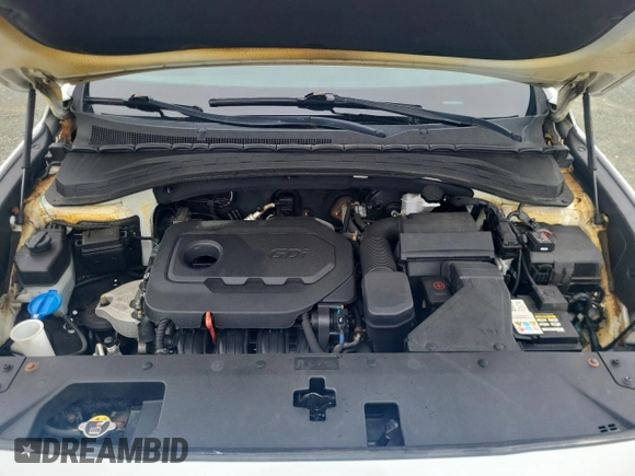 2019 Hyundai Santa Fe SE z VIN 5NMS2CAD3KH007792, wystawiony jako Copart lot #55074425 z przebiegiem 144 241 mil mil oraz Szkoda całkowita • Salvage title. Historia ofert i sprzedaży dostępna na DreamBid. Obrazek 12.