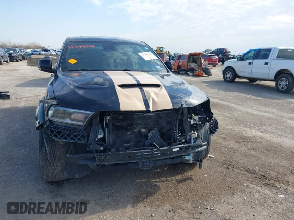 2019 Dodge Durango SRT with VIN 1C4SDJGJ2KC550562, listed as a IAAI auction lot 41549390 with 51,217 mi miles and . Bid and sale history available at DreamBid. Image 13.