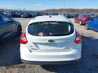 2012 Ford Focus SE z VIN 1FAHP3K29CL265135, wystawiony jako IAAI lot #40989480 z przebiegiem 158 742 mil mil oraz . Historia ofert i sprzedaży dostępna na DreamBid. Obrazek 16.
