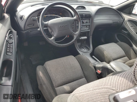1994 Ford Mustang z VIN 1FALP45T9RF162535, wystawiony jako Copart lot #53549795 z przebiegiem 86 430 mil mil oraz Szkoda całkowita • Salvage title. Historia ofert i sprzedaży dostępna na DreamBid. Obrazek 8.