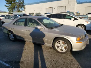 2000 Lincoln LS with VIN 1LNHM86S2YY817946, listed as a Copart auction lot 85547134 with 169,978 mi miles and Clean Title. Bid and sale history available at DreamBid. Image 4.