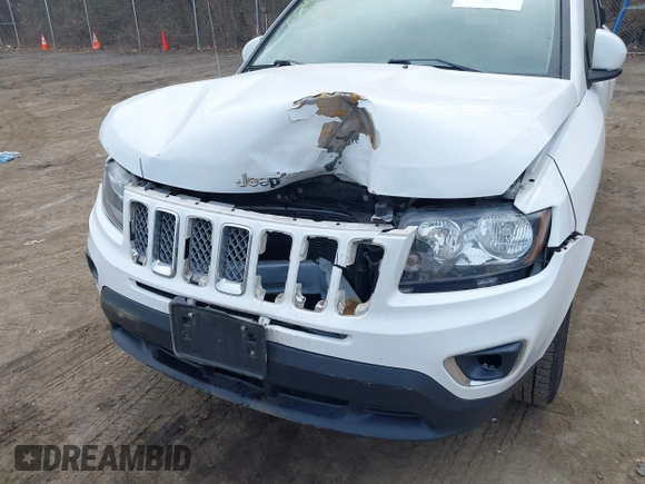 2016 Jeep Compass Latitude with VIN 1C4NJDEBXGD737018, listed as a IAAI auction lot 41800071 with 158,006 mi miles. Bid and sale history available at carsss.com. Image 6.