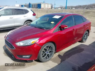 2015 Ford Focus SE with VIN 1FADP3F24FL362949, listed as a IAAI auction lot 41621904 with 104,447 mi miles. Bid and sale history available at carsss.com. Image 2.