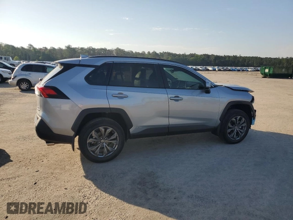 2024 Toyota RAV4 Hybrid XLE Premium z VIN 2T3B6RFV0RW074218, wystawiony jako Copart lot #56917295 z przebiegiem 14 969 mil mil oraz Szkoda całkowita • Salvage title. Historia ofert i sprzedaży dostępna na DreamBid. Obrazek 3.