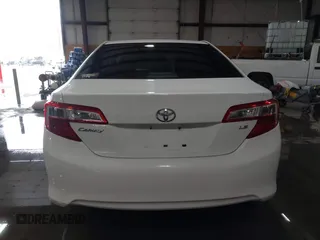 2014 Toyota Camry L with VIN 4T1BF1FKXEU306754, listed as a IAAI auction lot 41613218 with 195,692 mi miles. Bid and sale history available at carsss.com. Image 16.