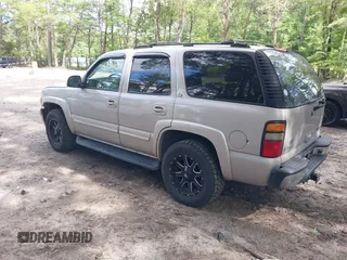2005 Chevrolet Tahoe LS z VIN 1GNEK13T45J167997, wystawiony jako IAAI lot #42298160 z przebiegiem 142 981 mil mil oraz . Historia ofert i sprzedaży dostępna na DreamBid. Obrazek 3.