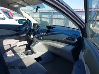2014 Honda CR-V LX with VIN 2HKRM4H39EH634676, listed as a IAAI auction lot 41233279 with 153,761 mi miles and . Bid and sale history available at carsss.com. Image 5.