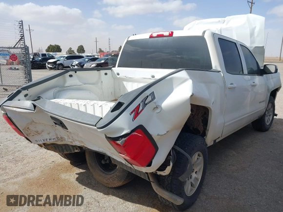 2018 Chevrolet Silverado 1500 LT with VIN 3GCUKREC9JG316576, listed as a IAAI auction lot 41830992 with 153,467 mi miles. Bid and sale history available at carsss.com. Image 4.