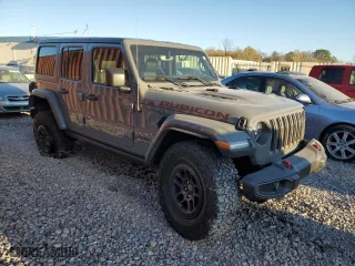 2023 Jeep Wrangler Rubicon with VIN 1C4JJXFG9PW678123, listed as a Copart auction lot 81574334 with 19,621 mi miles and Salvage Title. Bid and sale history available at carsss.com. Image 4.