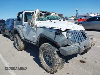 2013 Jeep Wrangler Rubicon 10th Anniversary z VIN 1C4BJWCG4DL533216, wystawiony jako IAAI lot #42323743 z przebiegiem Nie podano mil oraz . Historia ofert i sprzedaży dostępna na DreamBid. Obrazek 1.
