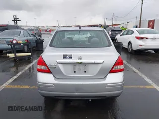 2009 Nissan Versa S with VIN 3N1BC11E39L364397, listed as a IAAI auction lot 41788772 with 223,959 mi miles and . Bid and sale history available at DreamBid. Image 16.