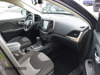 2014 Jeep Cherokee Latitude with VIN 1C4PJMCS0EW169696, listed as a IAAI auction lot 41647691 with 98,919 mi miles. Bid and sale history available at carsss.com. Image 5.