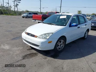 2003 Ford Focus with VIN 1FAHP34393W131102, listed as a IAAI auction lot 41703826 with 188,029 mi miles and . Bid and sale history available at DreamBid. Image 2.