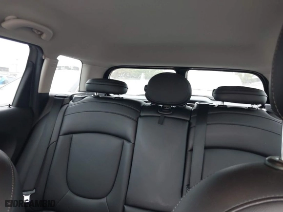 2016 MINI Cooper Clubman with VIN WMWLN5C56G2E30309, listed as a IAAI auction lot 41772501 with 67,584 mi miles. Bid and sale history available at carsss.com. Image 15.