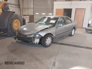 1996 Honda Accord LX with VIN 1HGCD563XTA141867, listed as a IAAI auction lot 41015252 with 420,800 mi miles and . Bid and sale history available at carsss.com. Image 17.